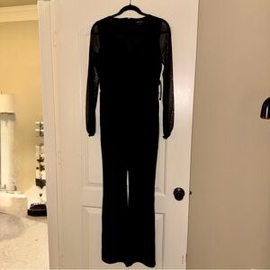 Black Sheer Long Sleeve Jumpsuit. Brand new